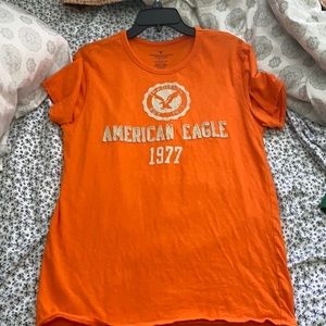 American Eagle Outfitter orange shirt.